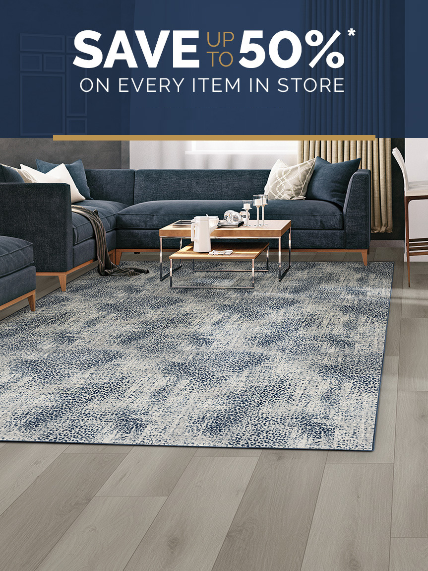 Family playing games in a living room with a hardwood floor