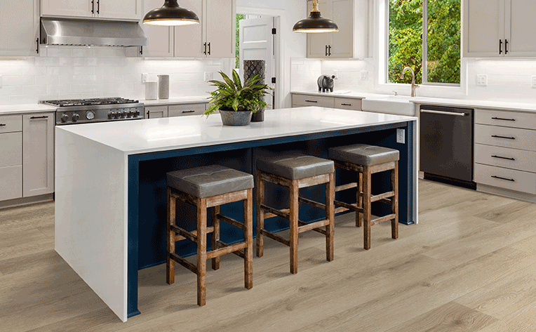 hardwood flooring in kitchen with white tile backsplash